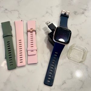 Fitbit Versa 2 with 3 bands, protective cover, and charger